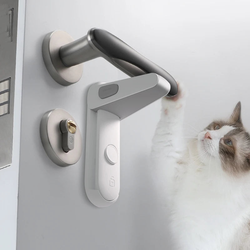 Cat reaching for a door handle secured with a white child lock. The lock prevents the handle from being turned, ensuring safety and restricting access.