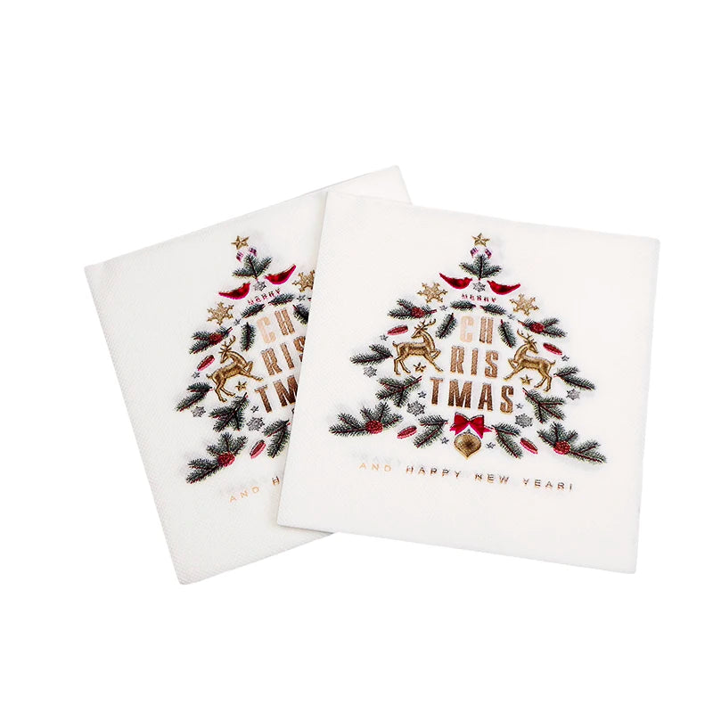 Two festive Christmas napkins featuring a tree design with gold text and reindeer, adorned with stars, birds, and branches. Text reads "Merry Christmas and Happy New Year!"