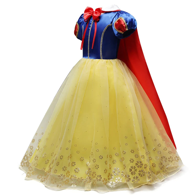 Children's princess dress with a blue bodice, red puffed sleeves, and a yellow tulle skirt adorned with gold floral patterns. Red cape and bow detail.