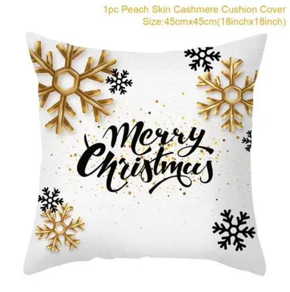 White cushion cover with gold and black snowflakes. The phrase "Merry Christmas" is elegantly written in black across the center. Dimensions noted as 45cm by 45cm.