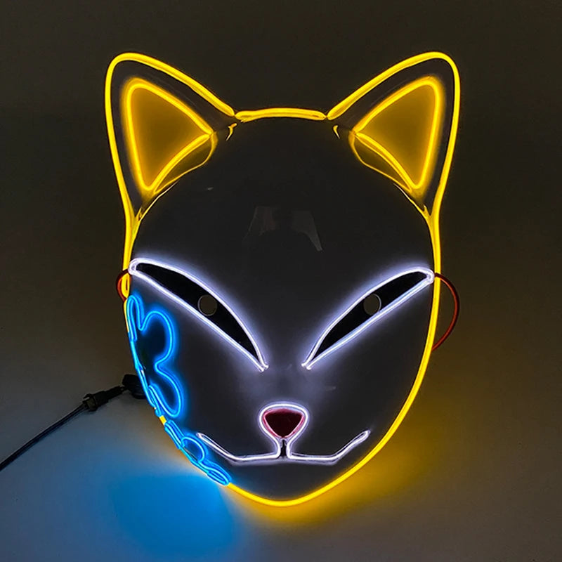 A cat-shaped neon mask with glowing yellow ears and white facial outlines, featuring blue accents and a small red nose, connected by a black cord.