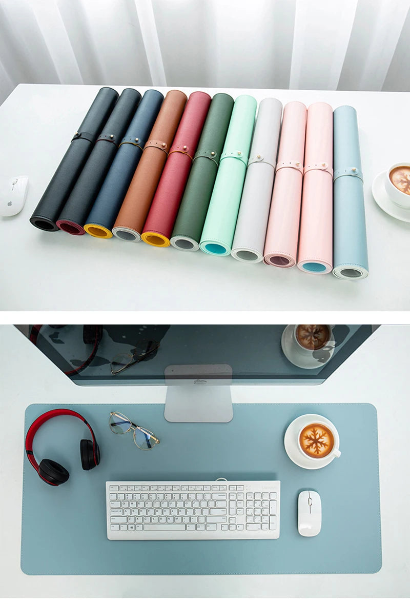 Colored desk mats rolled up, displayed next to a white mouse and coffee. Below, a blue mat with a keyboard, mouse, headphones, glasses, and a coffee mug featuring a leaf design.