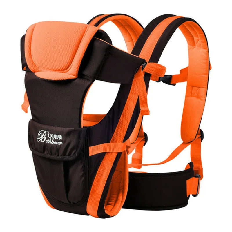 Black and orange baby carrier with padded shoulder straps and waist support. Features an ergonomic design for comfort, with branding visible on the front pocket.