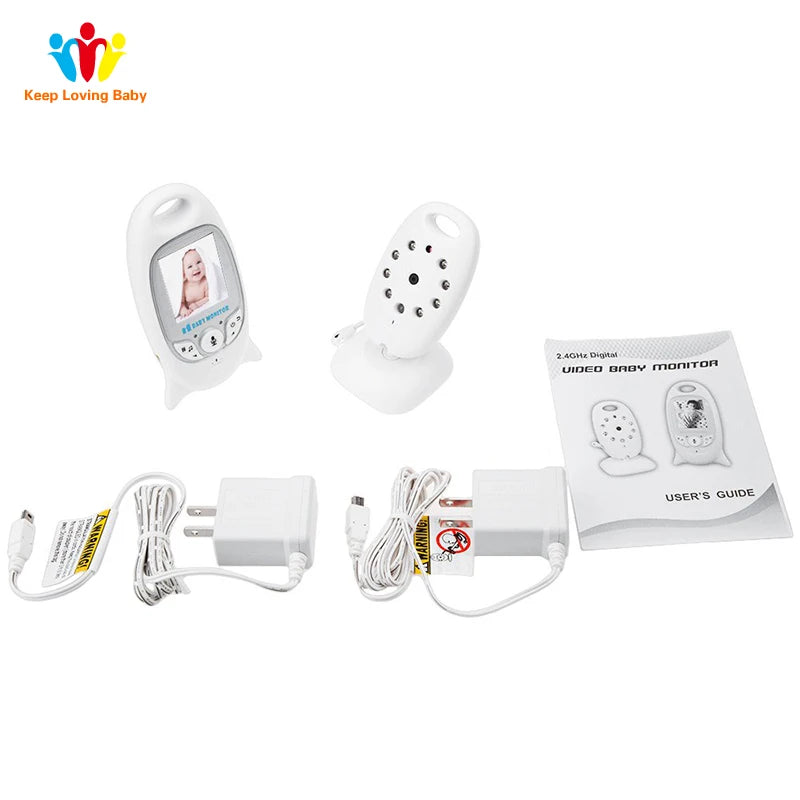 Video baby monitor set with camera and screen, two power adapters, and user guide. Screen displays a baby image. Accessories are placed on a white background.