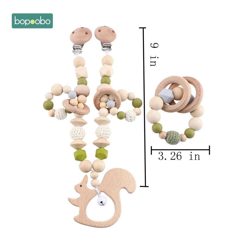 Wooden baby teething toy set with beads and crochet textures features a squirrel design and a bell. Sizes shown: hanging chain 9 inches, ring diameter 3.26 inches.