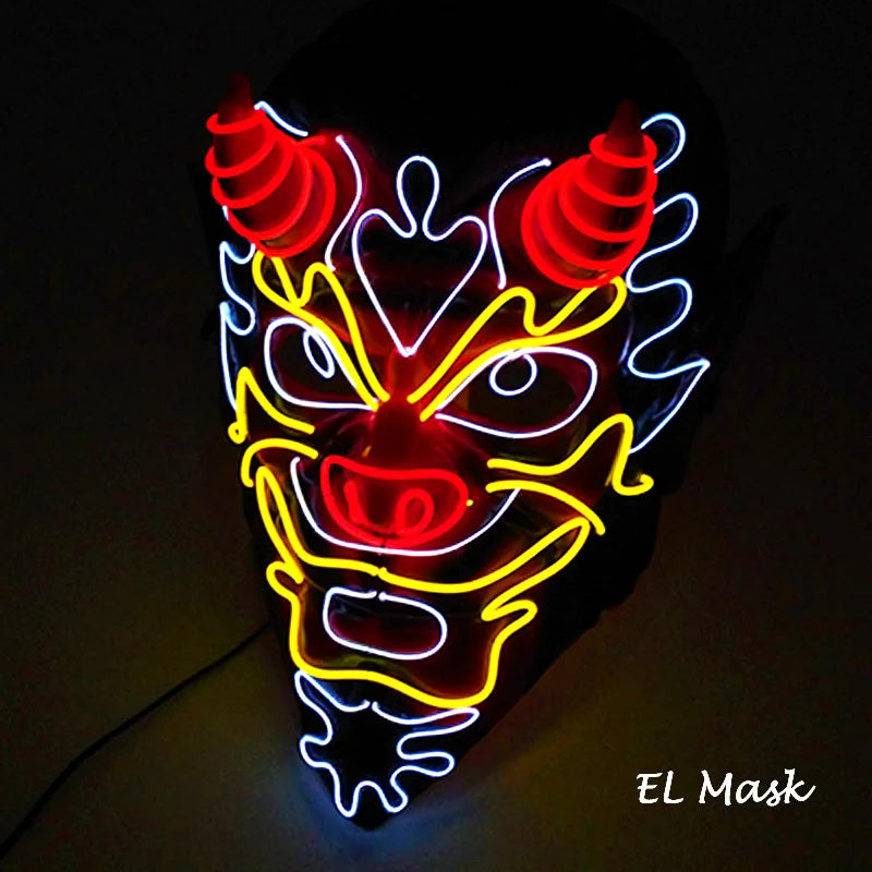 Illuminated demon-themed mask with neon outlines. Red horns, yellow facial features, and blue accents form a vibrant design. Text "EL Mask" is visible in the corner.