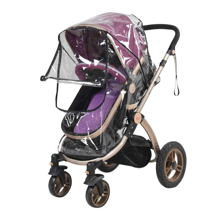 A purple baby stroller with a transparent rain cover, featuring a sturdy frame, four wheels, and a handlebar strap. The cover protects the seat from weather elements.