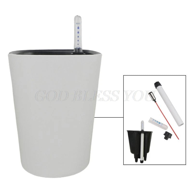 White self-watering planter with a water level indicator, showing disassembled parts: a black insert, a red water gauge, and a tube. The phrase "God Bless You" is lightly visible.