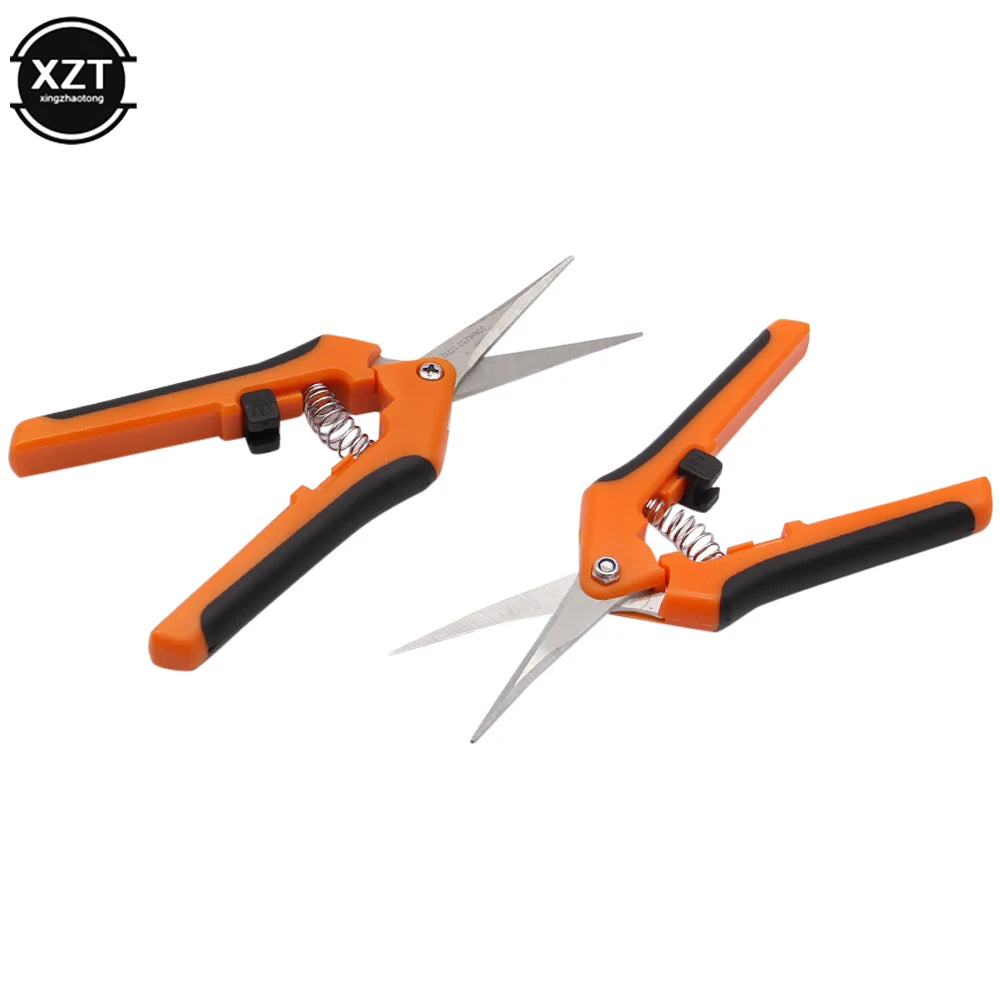 Two orange pruning shears with black grips, featuring sharp blades and a spring mechanism, are displayed against a white background.