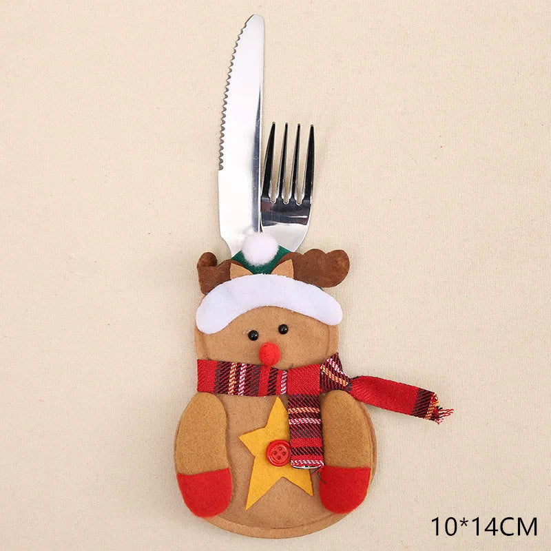A cute reindeer-themed felt utensil holder with a brown nose and antlers, red scarf, yellow star, and button detail. Contains a knife and fork. Measures 10x14 cm.