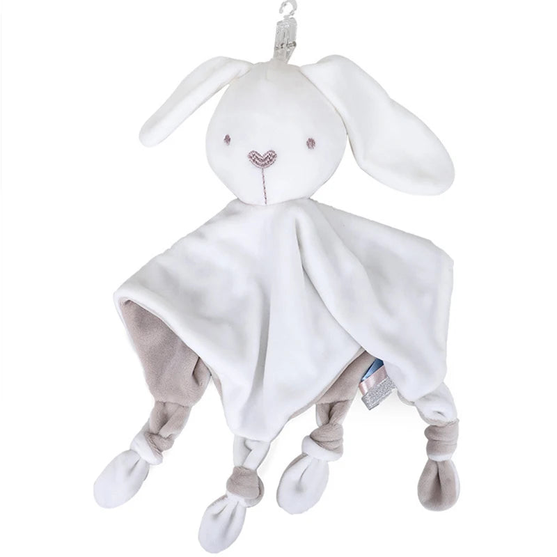 Soft plush bunny comforter with long ears. Attached to four knotted ends in shades of white and grey. Designed as a soothing baby accessory.