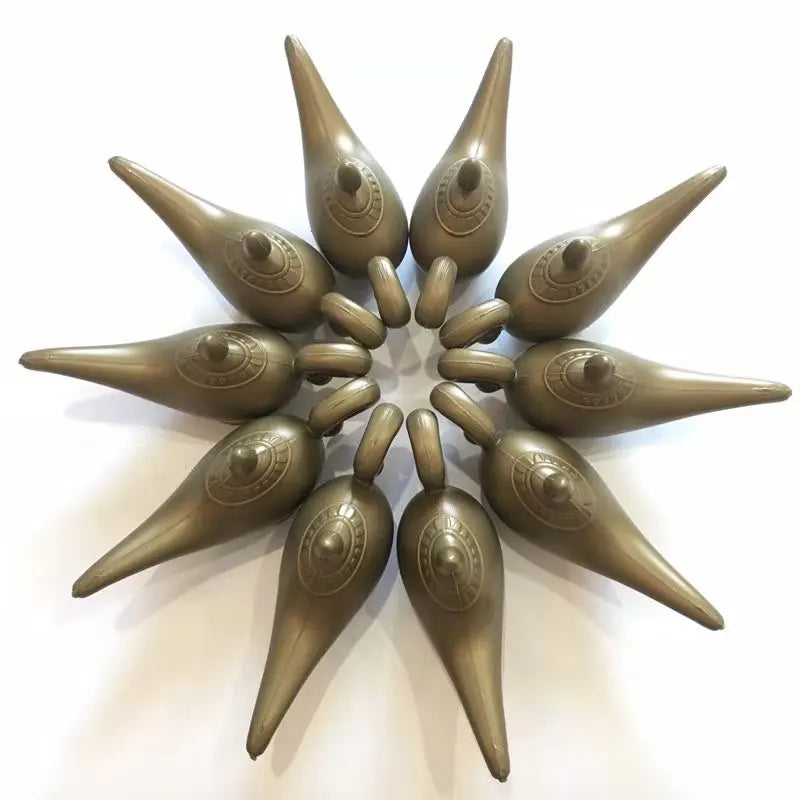 A circular arrangement of twelve identical, brown, teardrop-shaped objects with pointed ends, each featuring a patterned circular design near the top, placed against a white background.