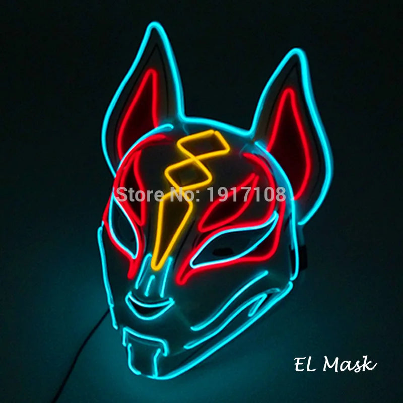 Neon fox mask with glowing red, blue, and yellow lights, featuring pointed ears and tribal designs. The mask is illuminated against a dark background. Text reads: "EL Mask".