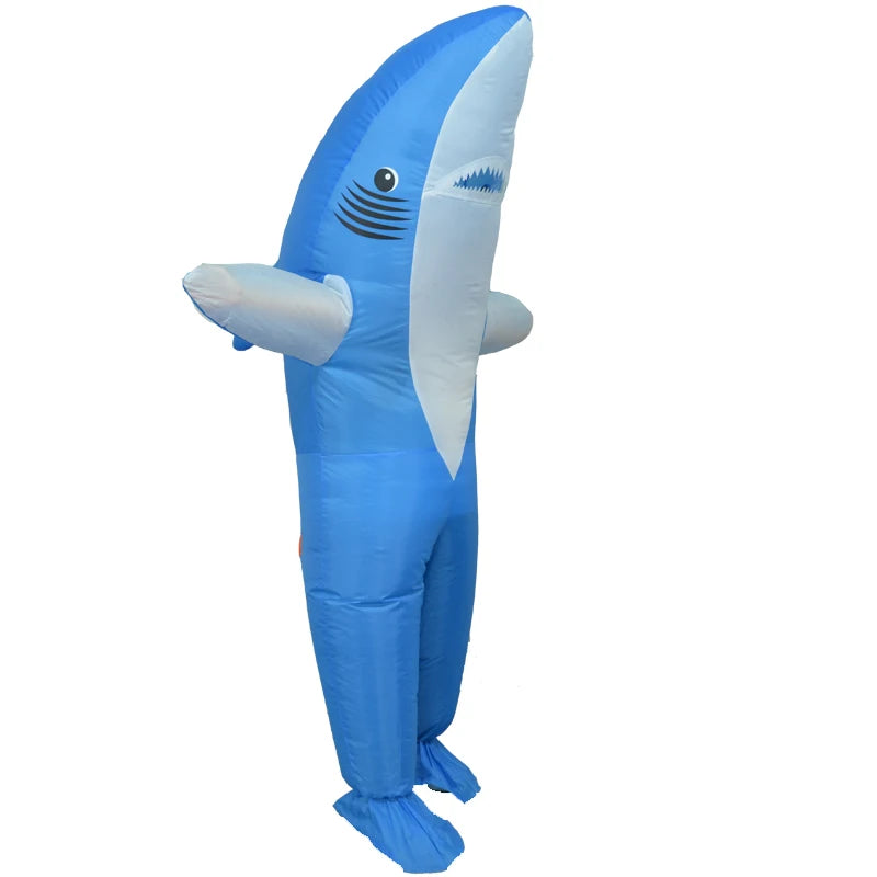 Inflatable blue shark costume with fins, side view. The suit is blue and white with cartoon facial features, creating a playful and whimsical appearance.
