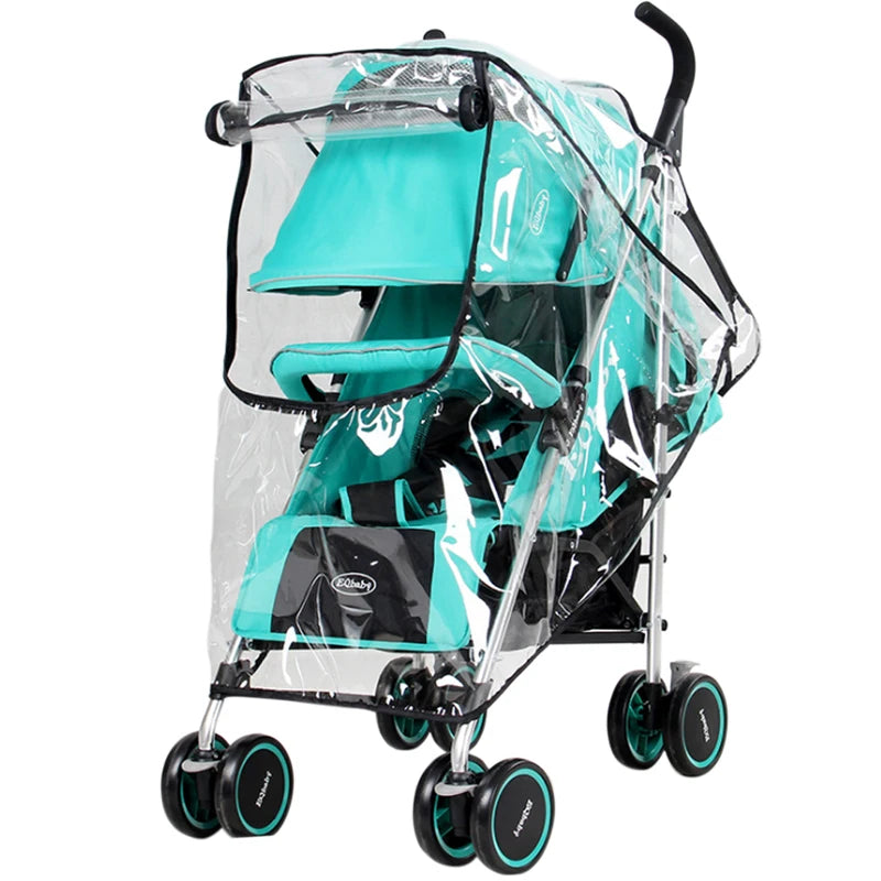 Turquoise baby stroller with black and teal wheels, covered by a transparent rain shield. It features a canopy and padded seating, designed for comfort and protection from weather.