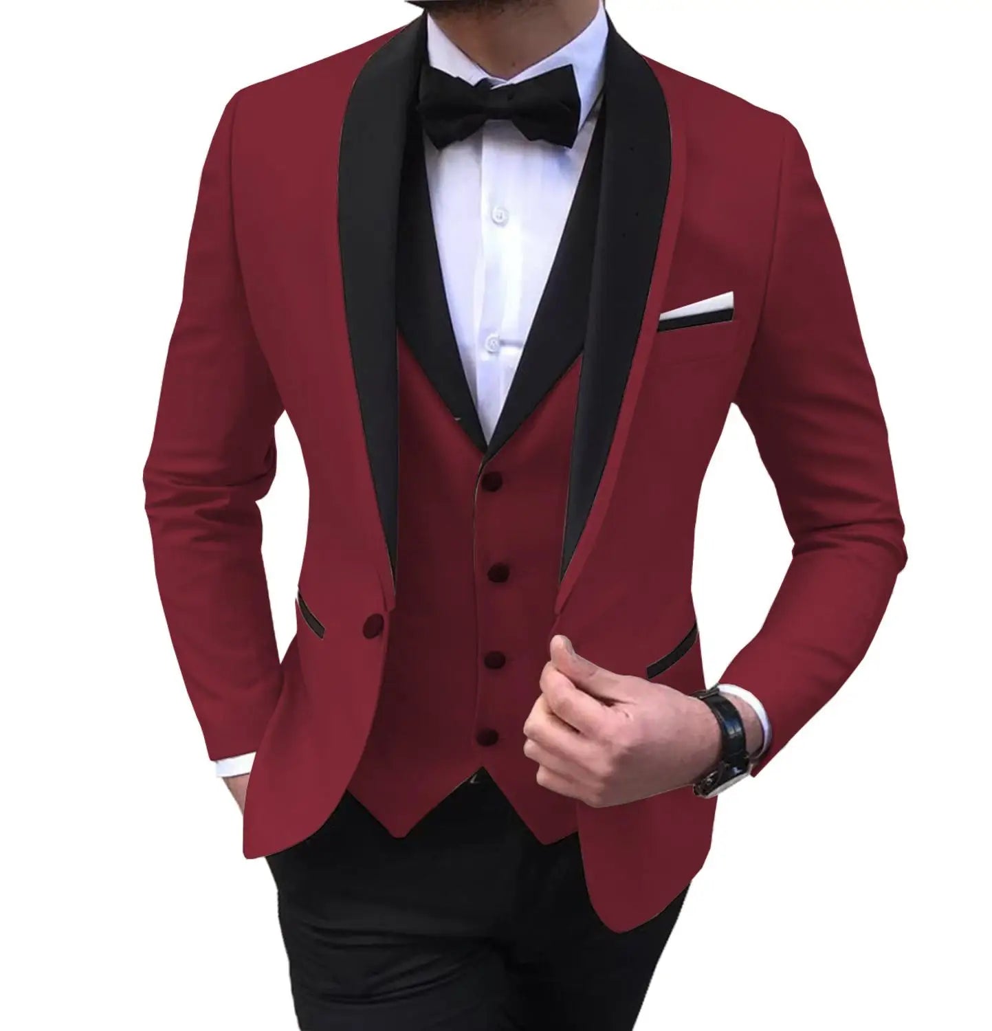 Man in a burgundy tuxedo with black lapels and trim, wearing a white shirt and black bow tie. Right hand adjusting the jacket, with a visible watch on the wrist.