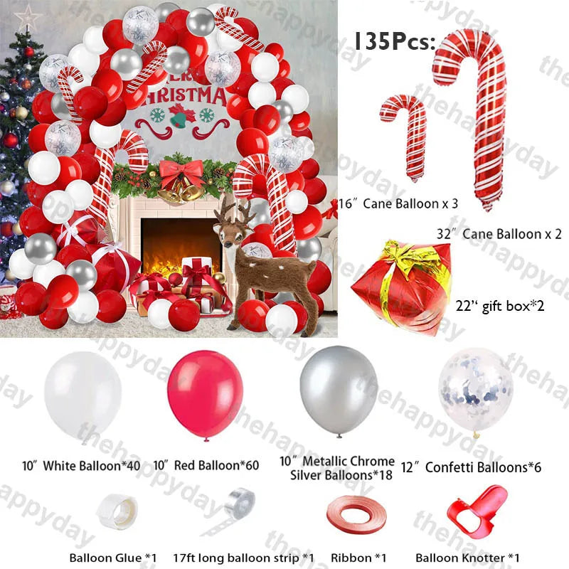 Festive Christmas balloon arch kit with red, white, and silver balloons, candy cane balloons, gift box decorations, and accessories, set against a fireplace and Christmas tree.