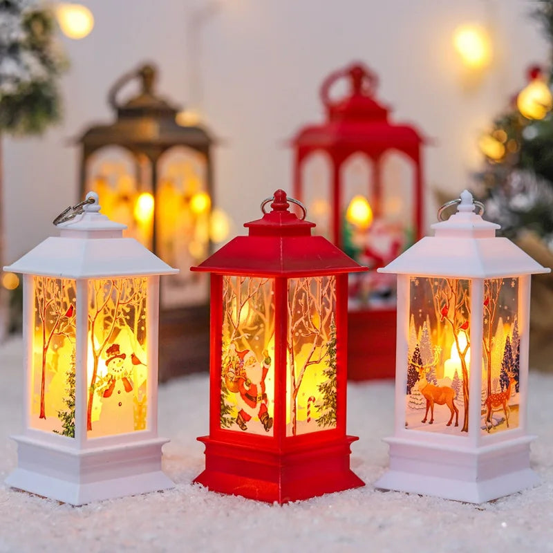 Festive lanterns in white and red, glowing with warm light. Each lantern features Christmas scenes with snowmen, Santa, and reindeer, set on a snowy surface with soft-focus lights behind.