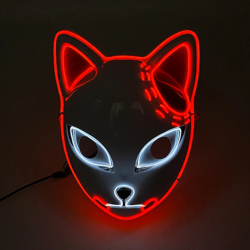 A neon mask with cat features glows in the dark. It has red outlines for ears and face details, with white accents around the eyes and nose, creating a striking effect.