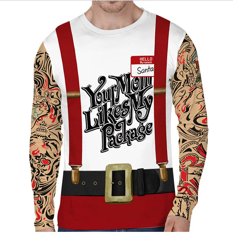 Man wearing a novelty shirt with tattoo sleeves, red suspenders, a belt graphic, and a cheeky message. A name tag sticker reads "Hello, my name is Santa."