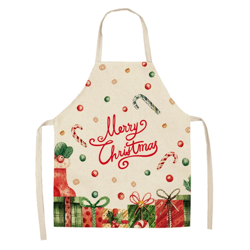 Festive apron with "Merry Christmas" text, candy canes, and baubles. The lower edge is decorated with wrapped Christmas gifts in red and green, with ribbon bows.