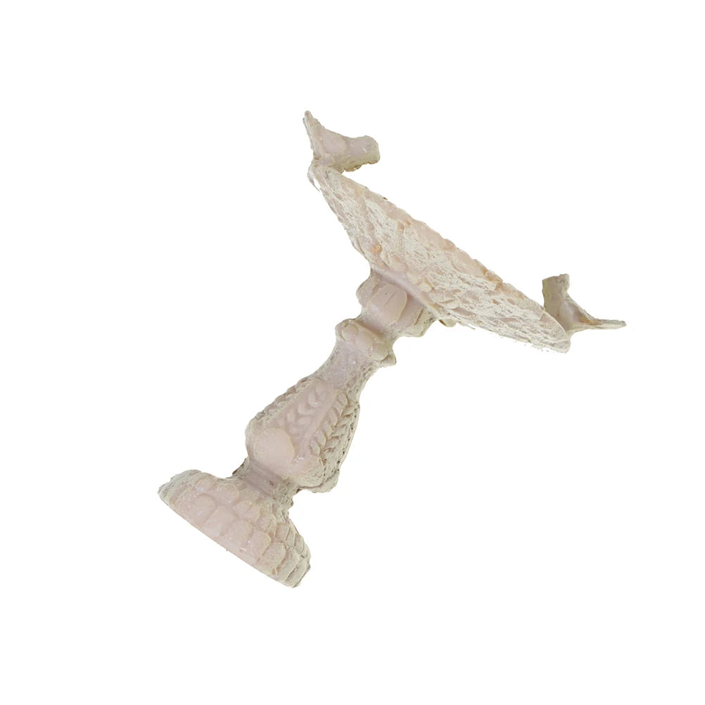 Ornate white birdbath with pedestal base and two sculpted birds perched on the rim, set against a plain white background.