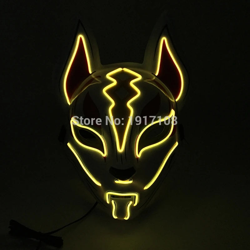Lit-up animal-themed mask featuring glowing yellow outlines and red accents on a dark background. The mask has pointed ears and stylized facial markings.