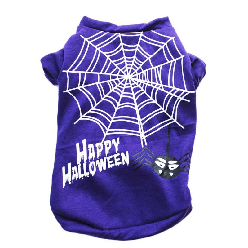 Purple pet shirt with a large spider web design and cartoon spider. "Happy Halloween" is printed in white beneath the web, adding a festive touch.