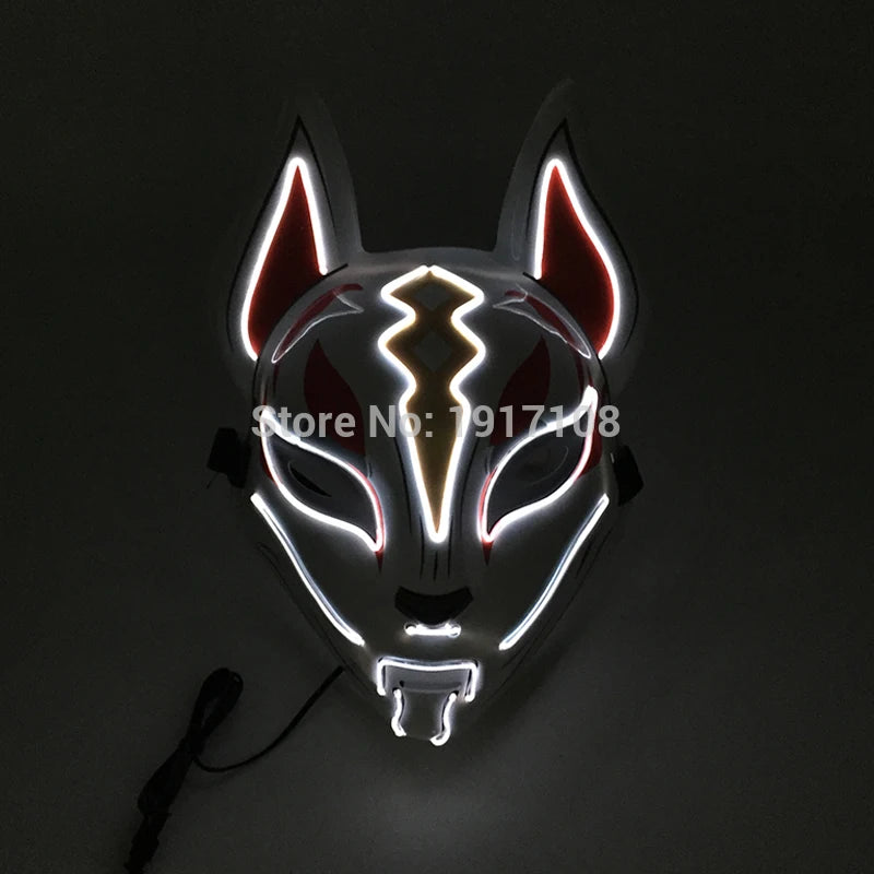 Illuminated fox mask with glowing LED outlines in red, white, and yellow. The mask features stylized eyes, ears, and a central lightning motif, connected to a black cable.