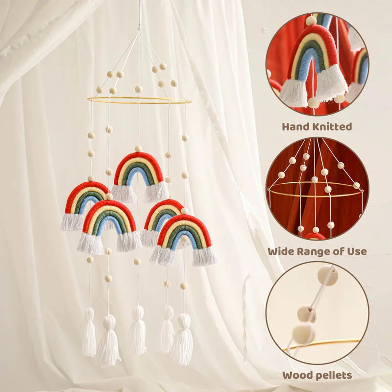 Hand-knitted baby mobile with colorful rainbow arches and tassels, featuring wooden pellets. Inset images highlight the mobile's design details and versatility.