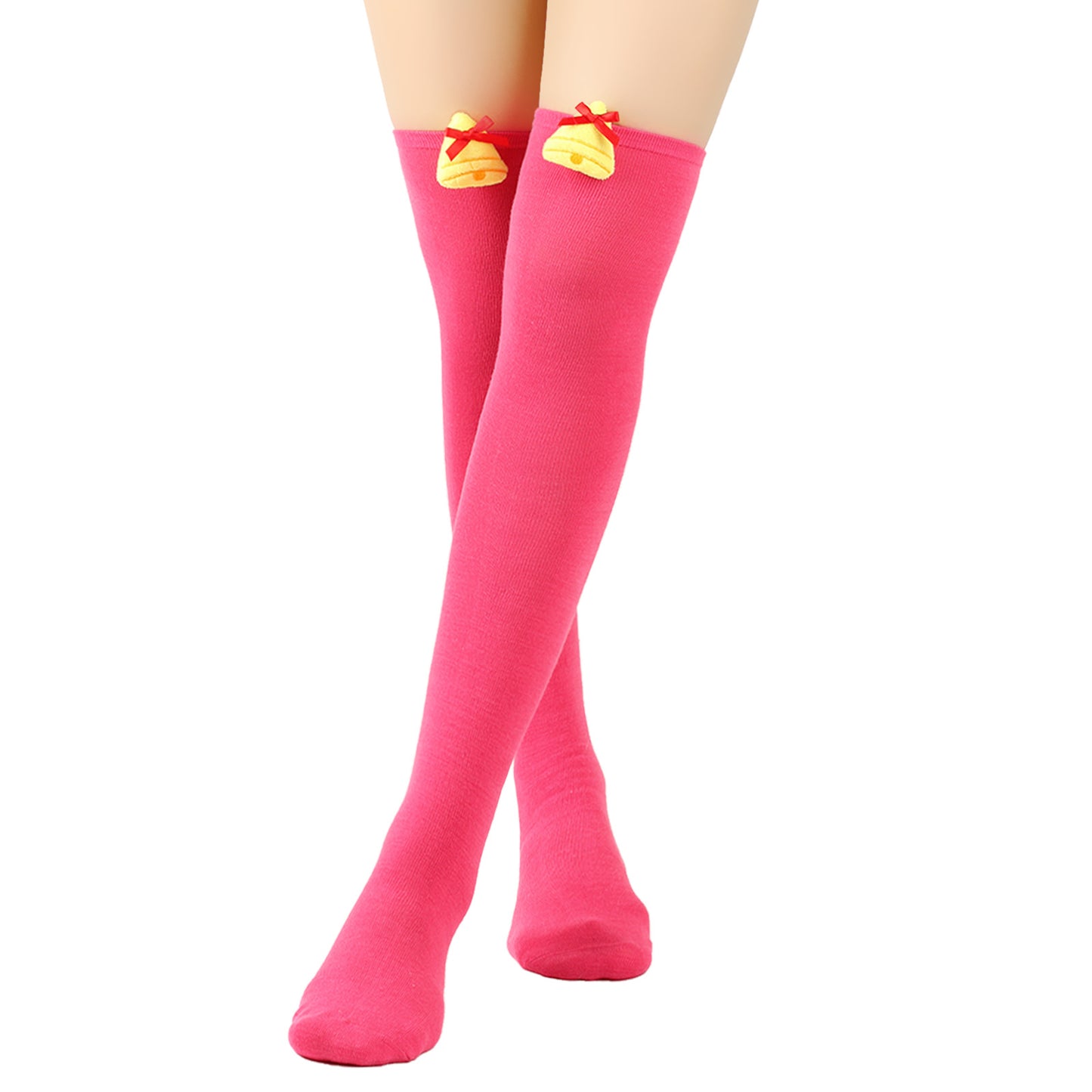 Pink knee-high socks with yellow bell decorations tied with red ribbons.