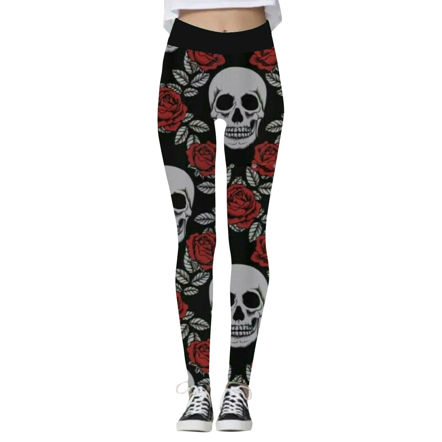 Black leggings with a bold design featuring white skulls and red roses, worn with black and white sneakers.