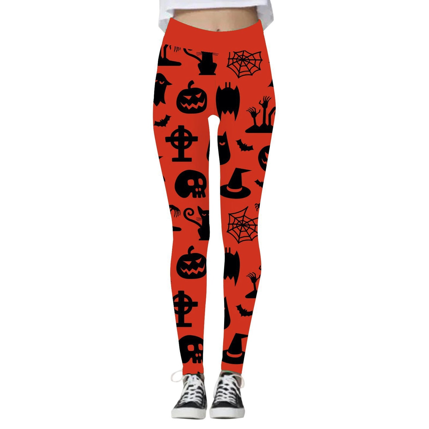 Red leggings with black Halloween-themed silhouettes, including bats, skulls, and pumpkins. The leggings are paired with black and white sneakers, shown on a white background.