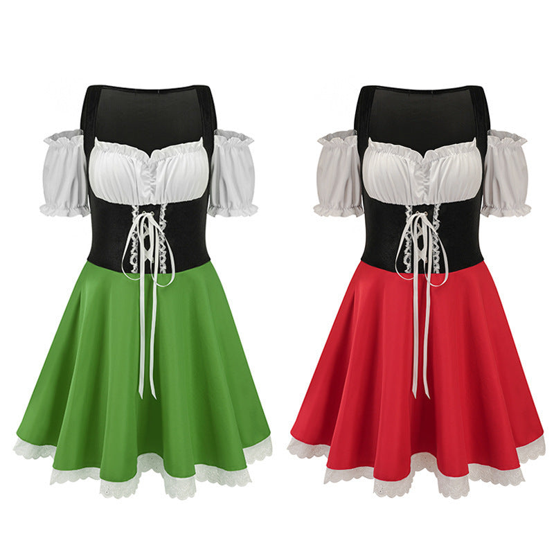 Two traditional dresses with puffy shoulders and lace-up bodices. One dress has a green skirt, the other red, both with white tops and lace-trimmed hems.