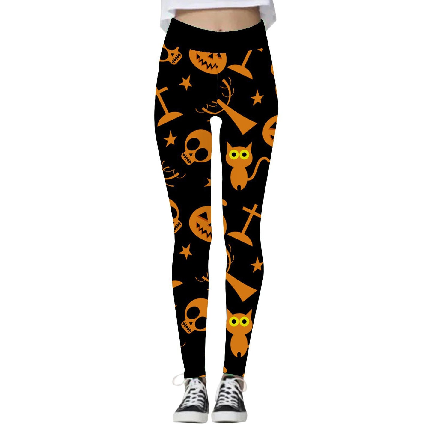 Black leggings with orange Halloween designs including skulls, pumpkins, cats, and crosses. Worn with black sneakers, paired with a white top.