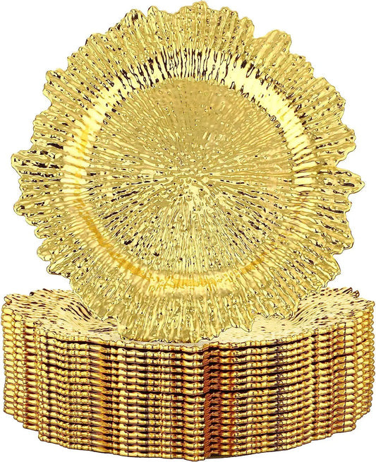 A stack of round, textured gold plates with a sunburst design. The shiny, intricate pattern highlights the elegant craftsmanship, creating a luxurious and decorative look.