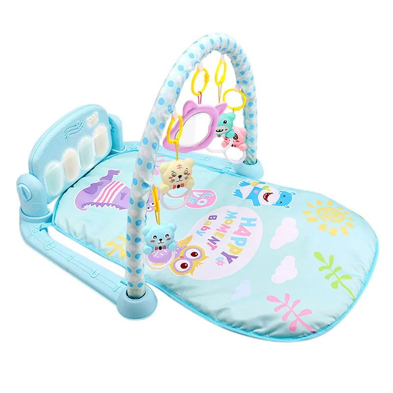 Blue baby play mat with polka-dot arches and hanging animal toys. Features musical keys, playful illustrations, and text "Happy Moment Baby." Colorful and engaging design.
