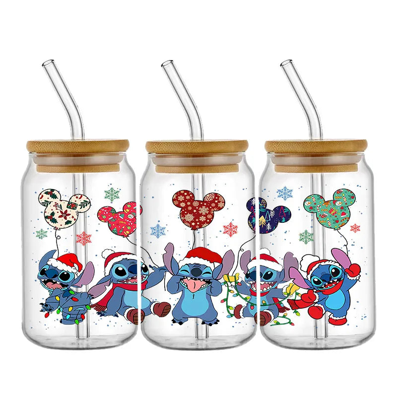 Three glass jars with bamboo lids, each depicting a blue cartoon figure in a Santa hat. They hold colorful balloon designs and are surrounded by festive snowflakes.