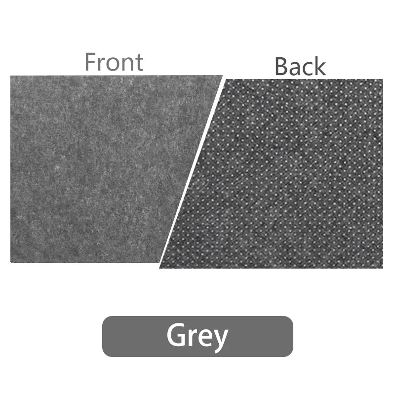 Close-up of grey fabric texture showing the front and back sides. The front is smooth, while the back features a dotted texture. A label below reads "Grey."