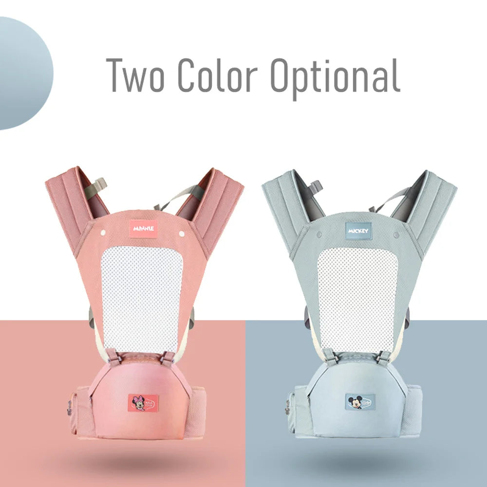 Two baby carriers are displayed side by side. The left one is pink, and the right one is blue, both featuring mesh front panels and cushioned straps. Text reads "Two Color Optional."