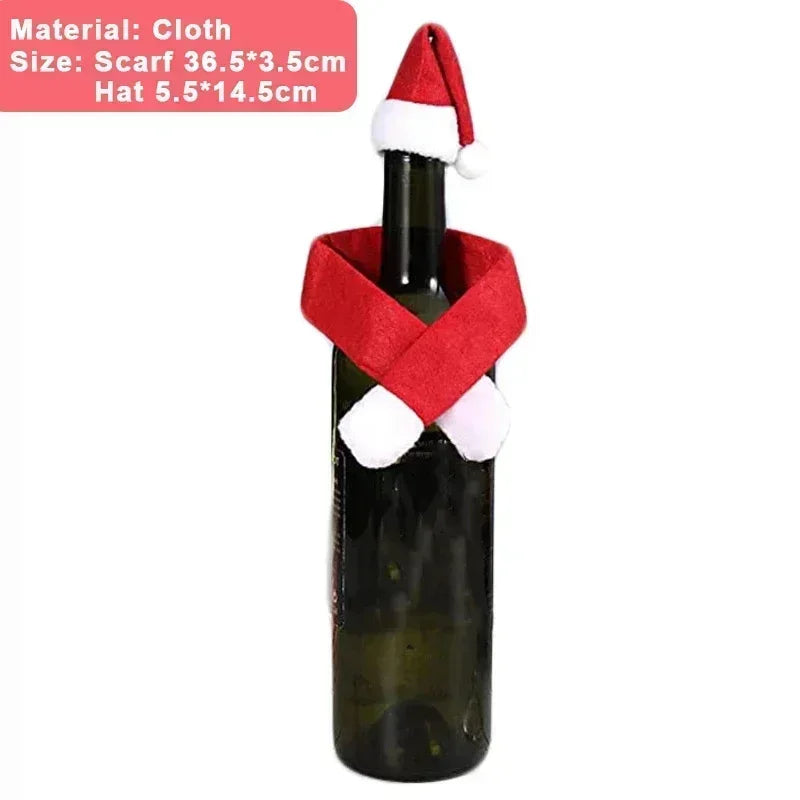 Dark glass bottle adorned with a red Santa hat and matching scarf. Dimensions mentioned for scarf (36.5x3.5cm) and hat (5.5x14.5cm), made of cloth.