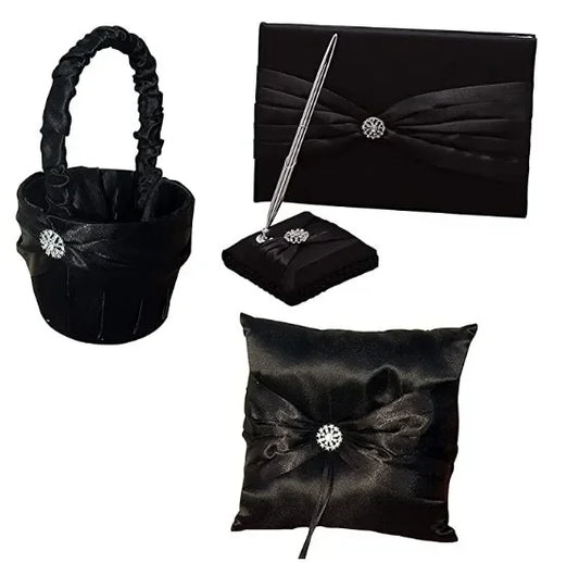 Black satin wedding set with rhinestone accents, includes a basket, guest book, pen on a stand, and a ring pillow. Each item is elegantly wrapped with pleated fabric.
