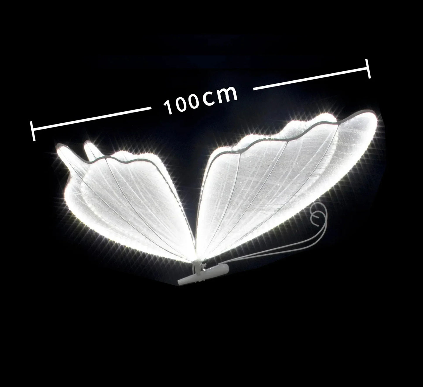 Luminous fairy wings with a span of 100cm glowing against a dark background, showcasing intricate patterns and a delicate design.
