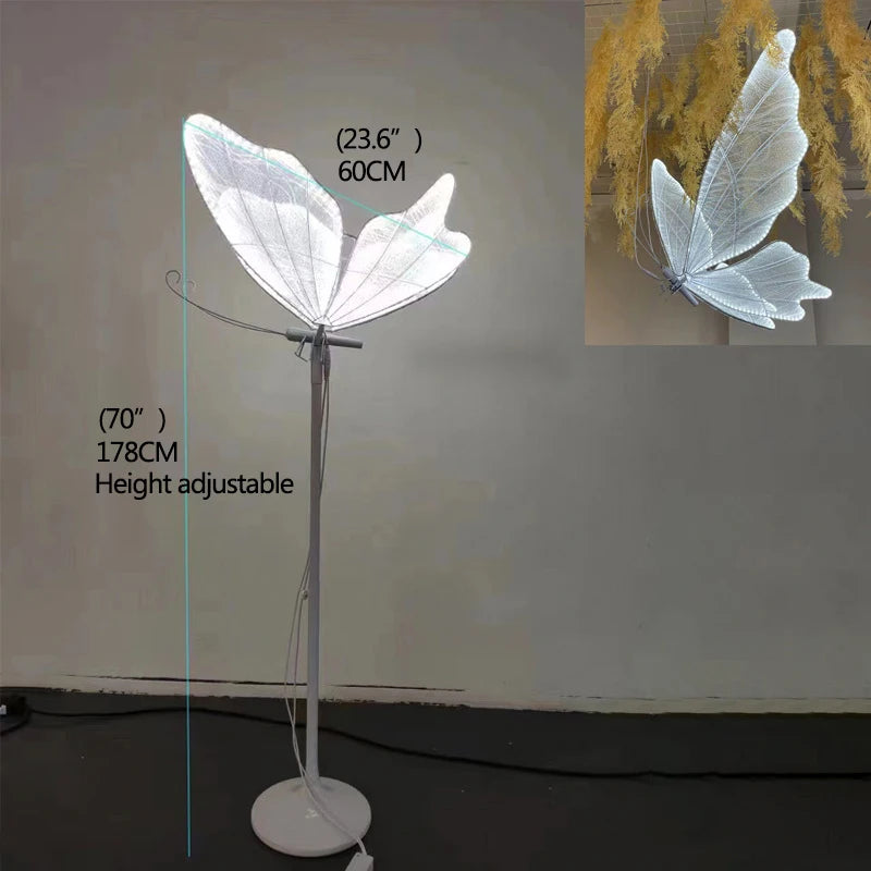 Floor lamp with white butterfly-shaped shade, 23.6 inches wide and 70 inches high, height adjustable. Inset shows a close-up of the lit butterfly shade.