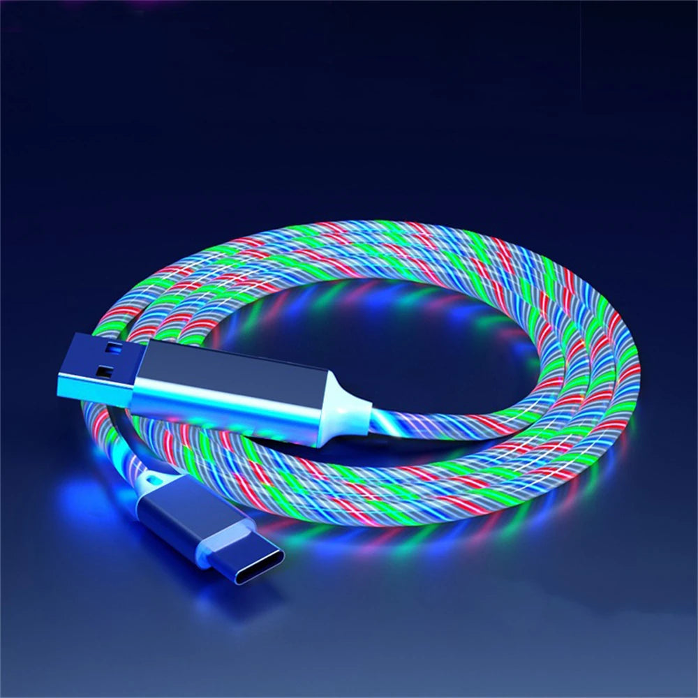 A glowing USB-C cable with vibrant blue, green, and red spiral lights against a dark background, showing the USB-A connector on one end and USB-C on the other.