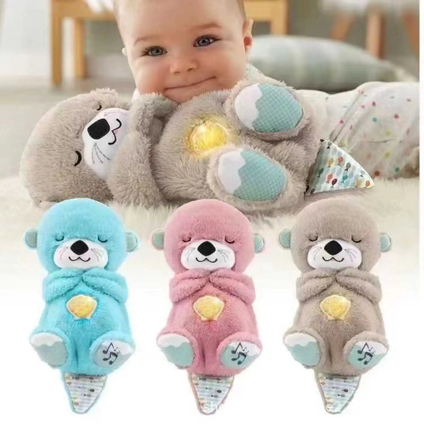 A baby cuddles a grey, plush otter toy with a glowing heart. Below are three similar plush otters in blue, pink, and brown, each with closed eyes and musical notes on their feet.