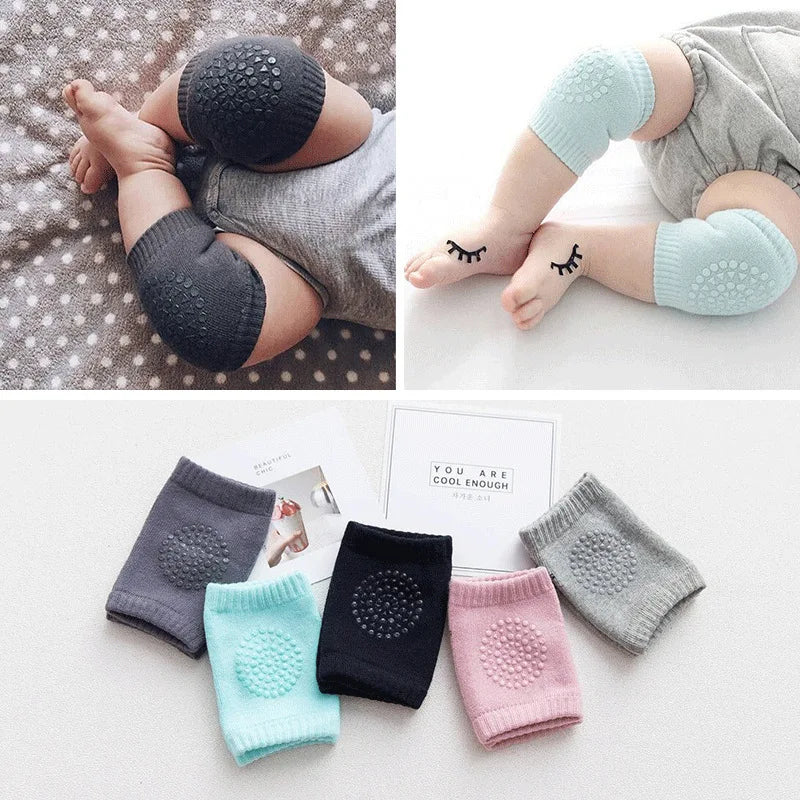 Babies wearing non-slip knee pads in gray and mint, with close-up of designs. Various colors displayed: gray, mint, black, pink, and light gray. Background features a "You Are Cool Enough" card.