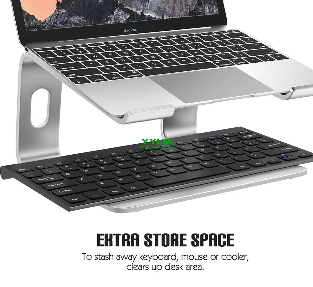 Laptop on a silver stand with a keyboard stored underneath. The setup maximizes desk space, with text highlighting extra storage for keyboard, mouse, or cooler.