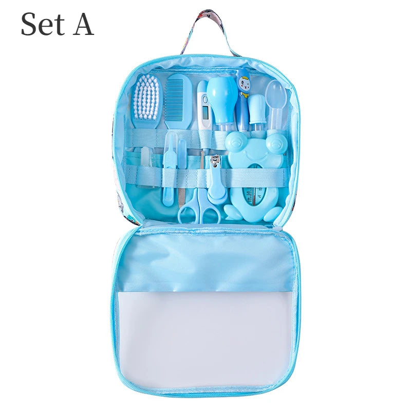 Blue baby grooming kit in a zippered case labeled "Set A." Includes comb, brush, thermometer, nail clipper, scissors, and other essentials, all neatly organized.