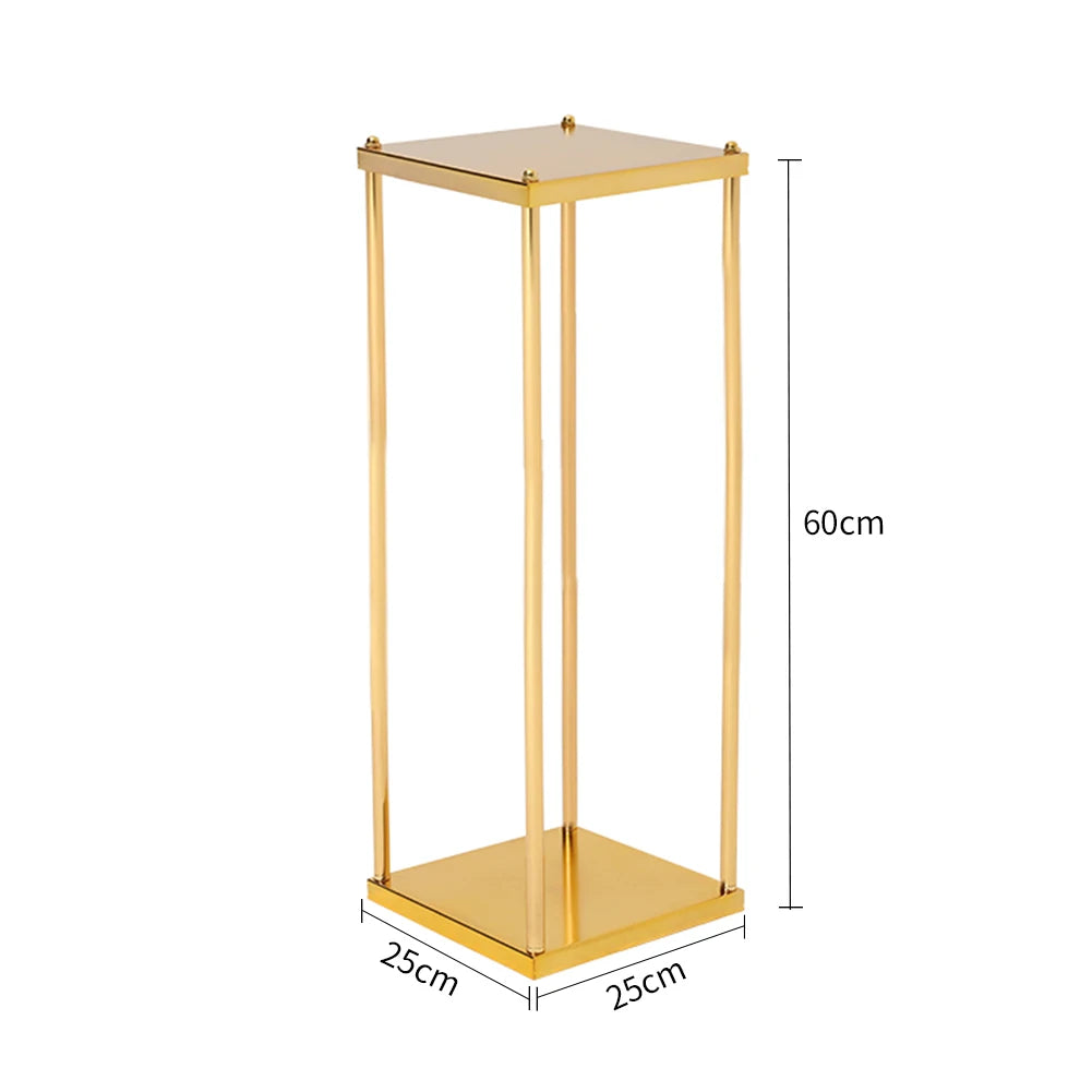 A gold metal stand with a square base and top, measuring 60cm in height and 25cm in width. The minimalist design features four vertical supports connecting the base and top.